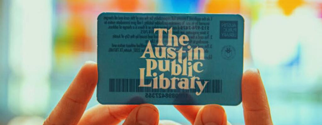 holding a new library card